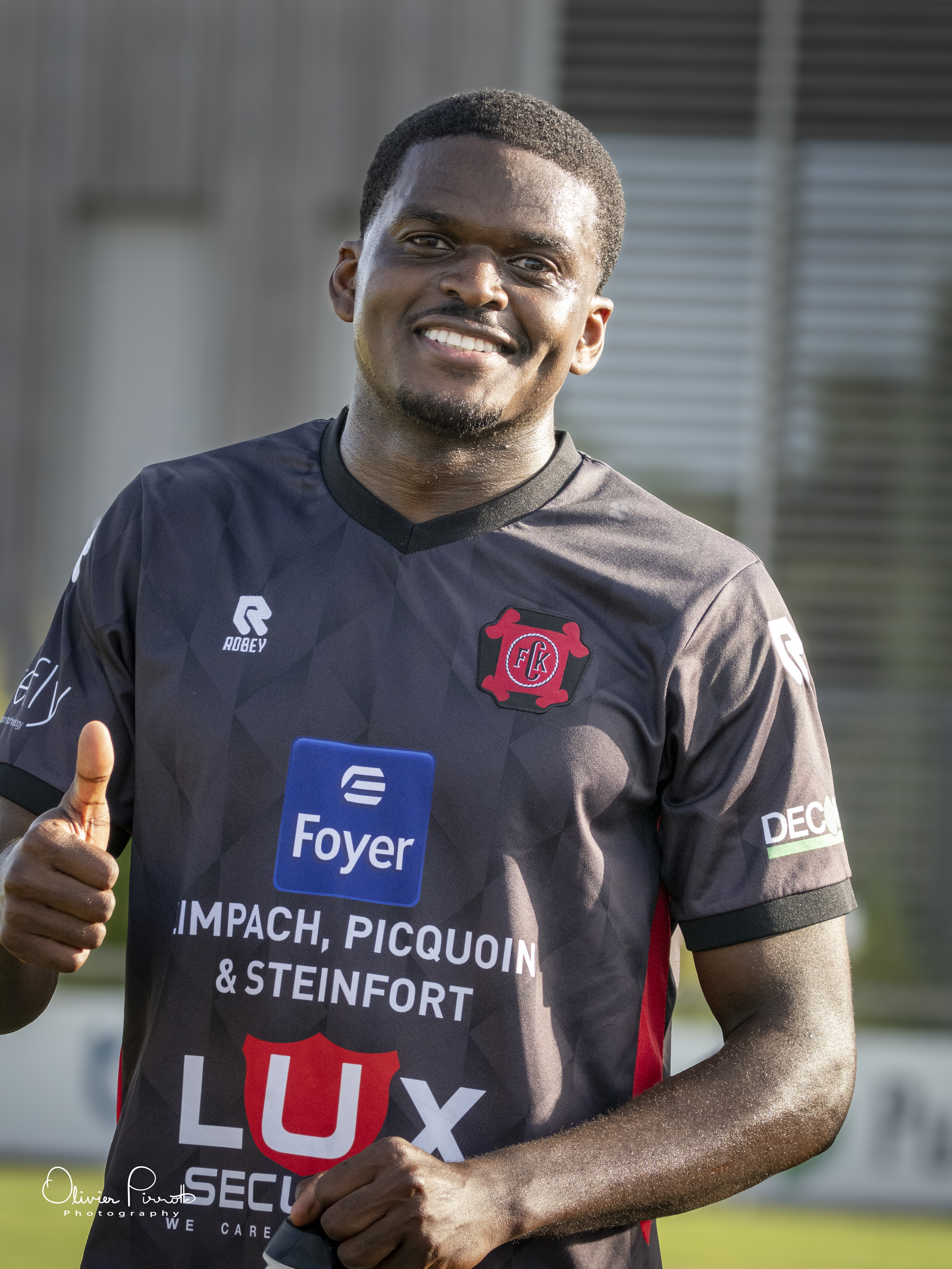Football player standing during a match