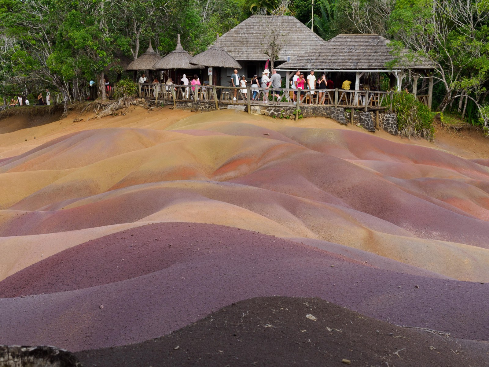 Folded bands of coloured soil at the Terre des Sept Couleurs.